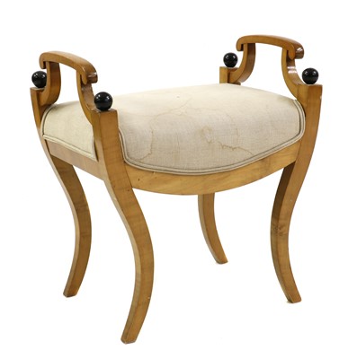 Lot 429 - A Biedermeier-style maple and ebonised stool