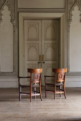 Lot 58 - ☘ A set of four Biedermeier walnut bar-back armchairs