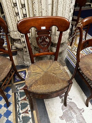 Lot 58 - ☘ A set of four Biedermeier walnut bar-back armchairs