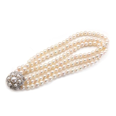 Lot 97 - A three row uniform cultured pearl necklace