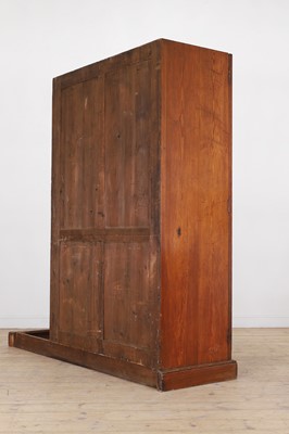 Lot 400 - A late Victorian pitch pine wardrobe by Howard & Sons