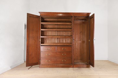 Lot 400 - A late Victorian pitch pine wardrobe by Howard & Sons