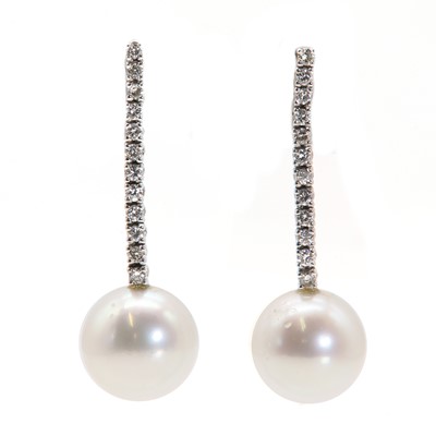 Lot 203 - A pair of cultured South Sea pearl and diamond drop earrings