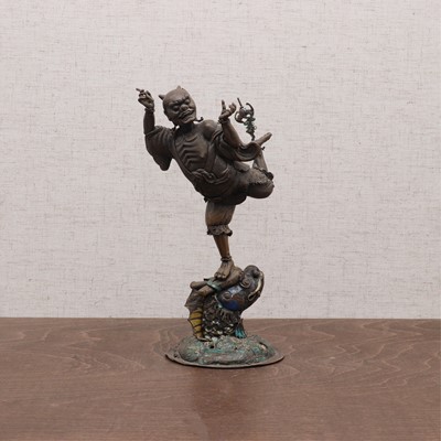Lot 223 - A Chinese brass figure