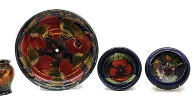 Lot 192 - A Moorcroft pottery 'Pansy' pattern and Tudric pewter mounted dish