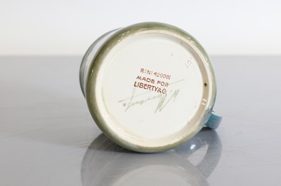 Lot 68 - A Liberty & Co. Moorcroft 'Claremont' pottery christening mug