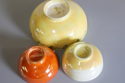 Lot 57 - A collection of Ruskin and Moorcroft lustre bowls, a vase, and a pot and cover