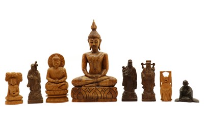 Lot 146 - A group of eight carved Chinese figures