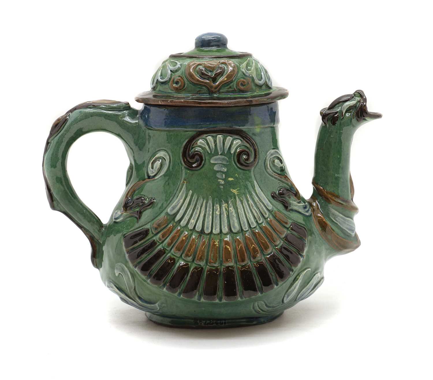 Lot 182 - A Brannam pottery teapot,