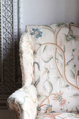 Lot 108 - A George III-style mahogany-framed wingback armchair