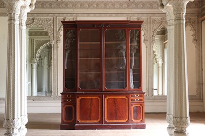 Lot 208 - ☘ A mahogany and satinwood breakfront library bookcase