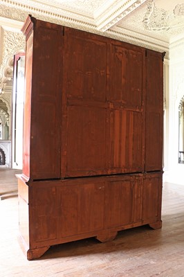 Lot 208 - ☘ A mahogany and satinwood breakfront library bookcase