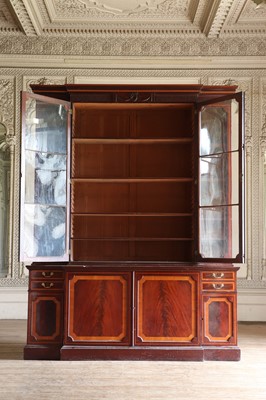 Lot 208 - ☘ A mahogany and satinwood breakfront library bookcase