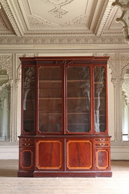 Lot 208 - ☘ A mahogany and satinwood breakfront library bookcase