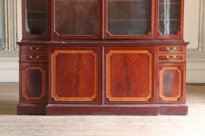 Lot 208 - ☘ A mahogany and satinwood breakfront library bookcase