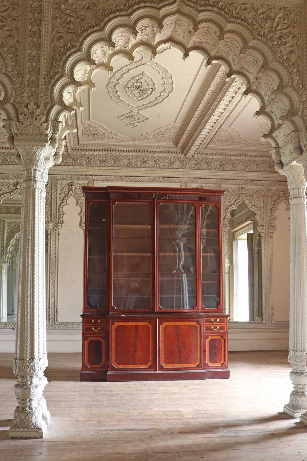 Lot 208 - ☘ A mahogany and satinwood breakfront library bookcase