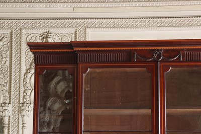 Lot 208 - ☘ A mahogany and satinwood breakfront library bookcase