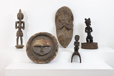 Lot 199A - A group of five tribal wood carvings