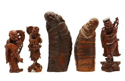 Lot 145 - A group of Chinese five carved wood figures