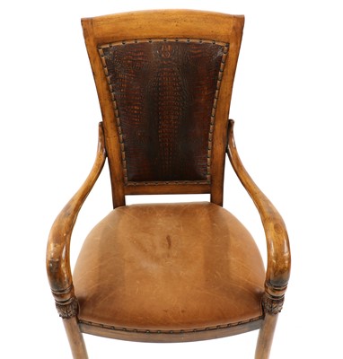 Lot 455 - An Austrian satin birch open armchair