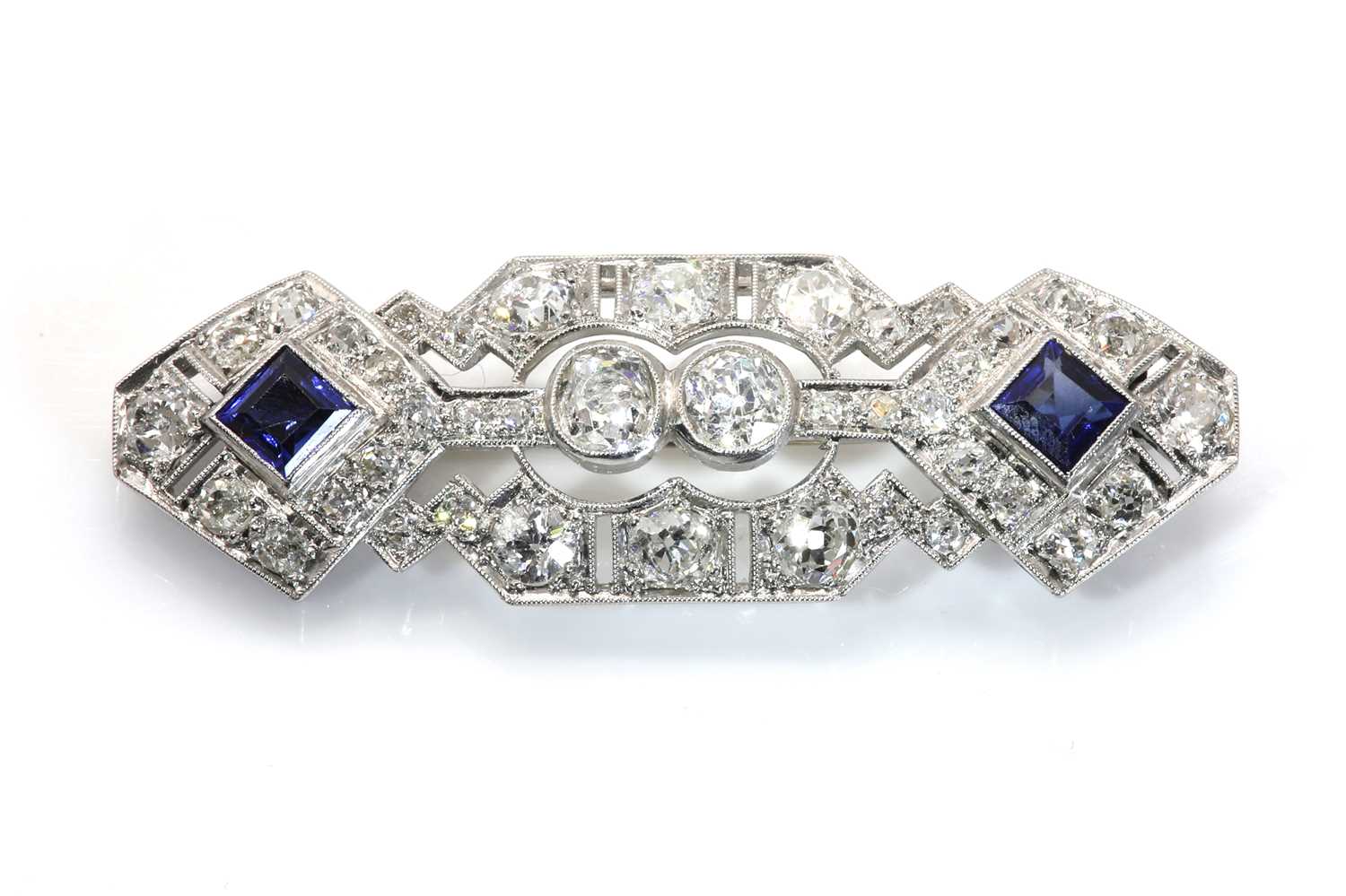 Lot 39 - An Art Deco sapphire and diamond plaque brooch