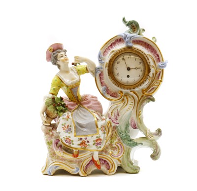 Lot 194 - A Vienna porcelain figural mantel clock