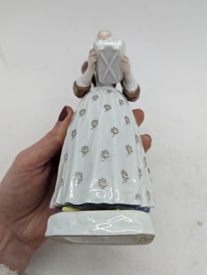 Lot 248 - A Meissen porcelain figure of 'La Belle Chocolatiere'