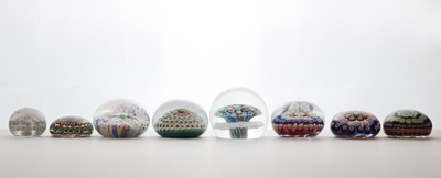 Lot 193 - A collection of glass paperweights