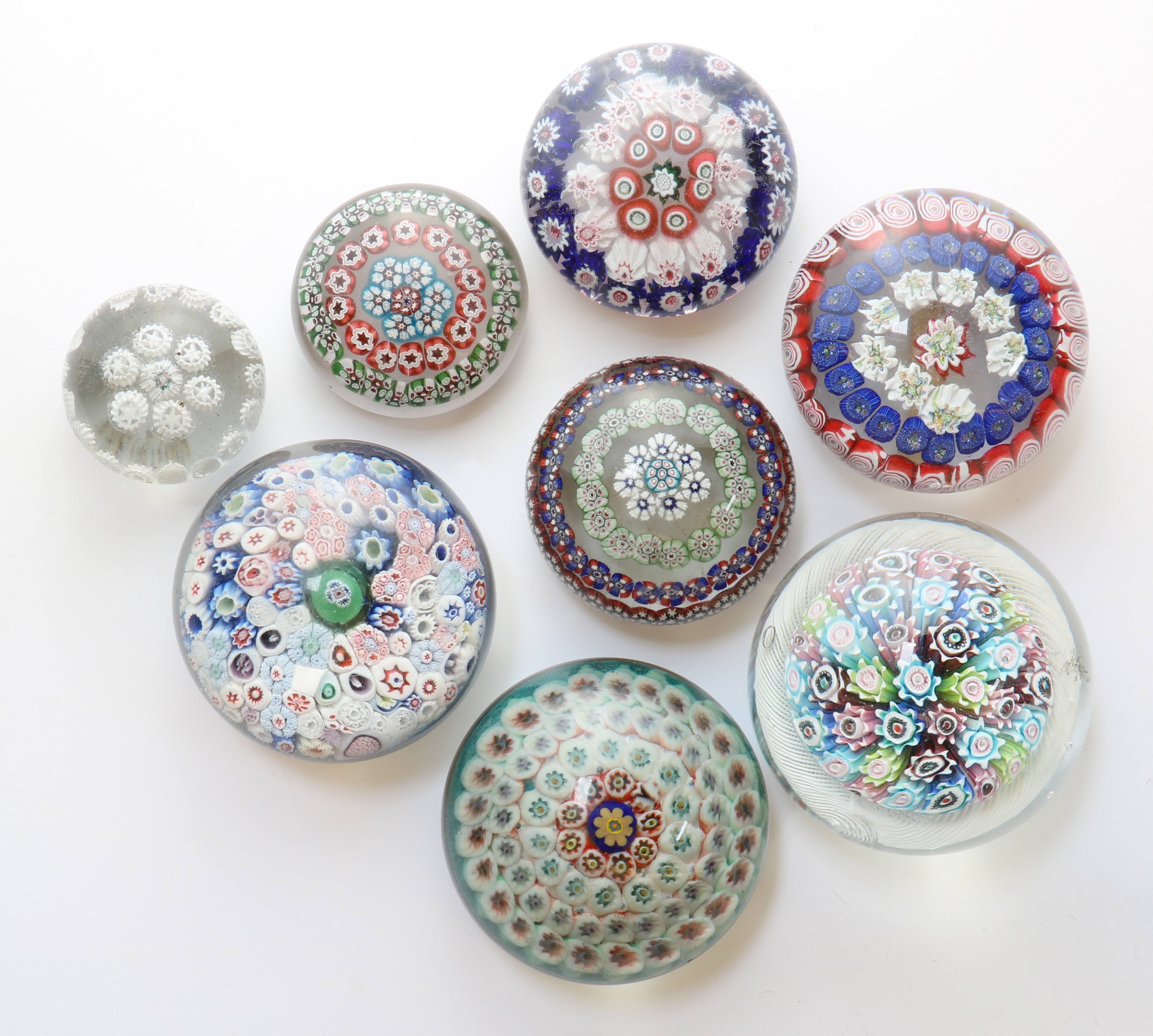 Lot 193 - A collection of glass paperweights,