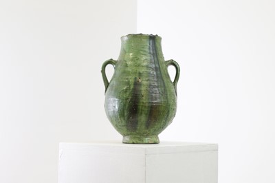 Lot 448 - A green-glazed stoneware pot