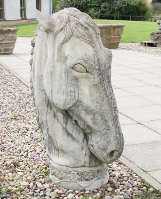 Lot 520 - A reconstituted stone horses head