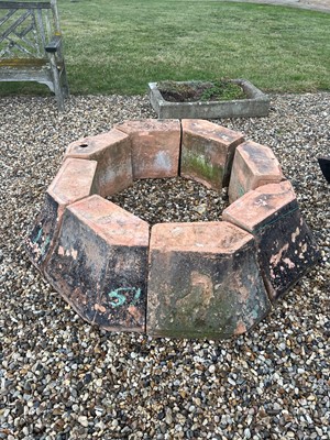 Lot 521 - A terracotta fountain surround