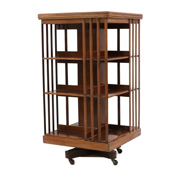 Lot 436 - A Victorian walnut revolving bookcase