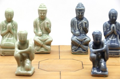 Lot 180 - A Thai Celadon glazed porcelain chess set