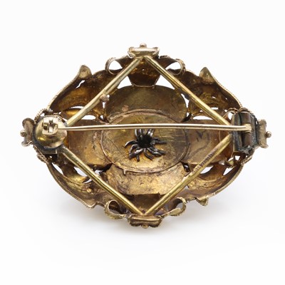 Lot 7 - A Victorian foiled garnet and rose cut diamond brooch