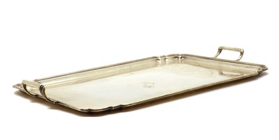 Lot 13 - A silver twin handled tray