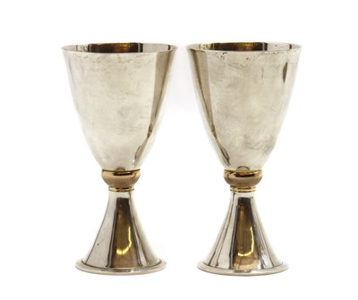 Lot 15 - A pair of limited edition silver wedding cups
