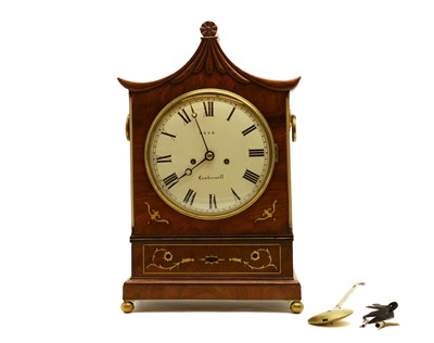 Lot 247 - A Regency mahogany and a brass inlaid bracket clock