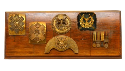 Lot 125A - A group of medals and military badges