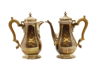 Lot 29 - A pair of silver coffee pots