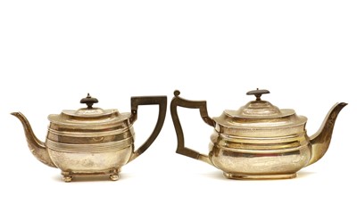 Lot 11 - Two Victorian silver teapots