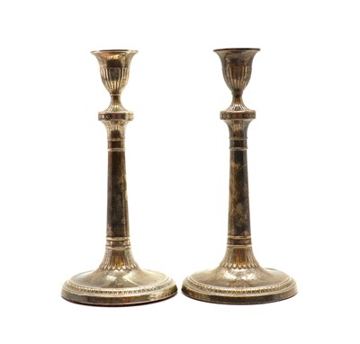 Lot 2 - A pair of George III silver candlesticks