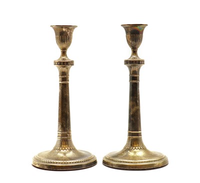 Lot 2 - A pair of George III silver candlesticks
