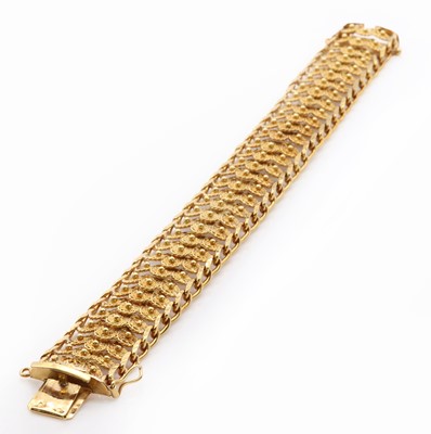 Lot 116 - A gold cannetille work bracelet