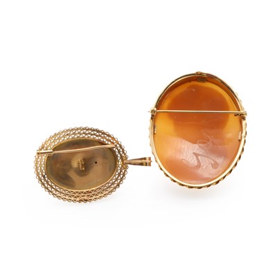 Lot 143 - Two gold mounted brooches