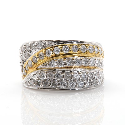 Lot 96 - An 18ct white gold diamond set tapered band ring