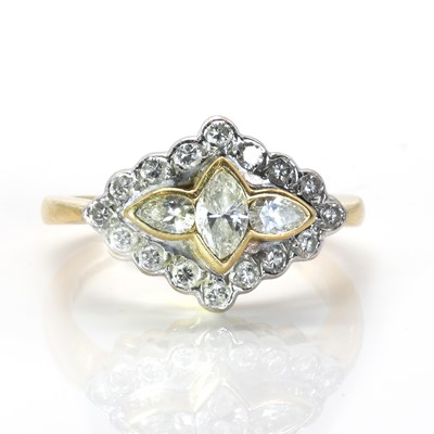 Lot 117 - An 18ct two colour gold diamond cluster ring