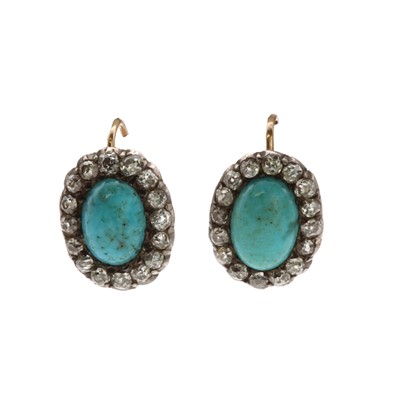 Lot 21 - A pair of turquoise and diamond cluster drop earrings