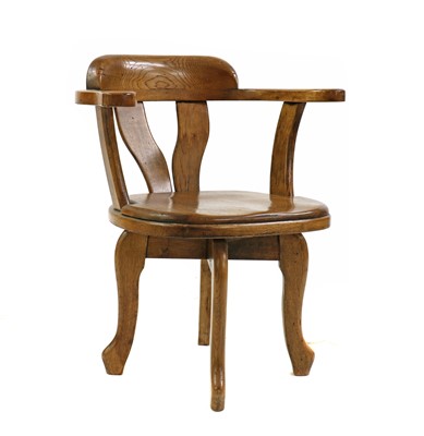Lot 428 - An oak desk chair