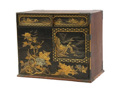 Lot 434 - A Japanese lacquered table cabinet